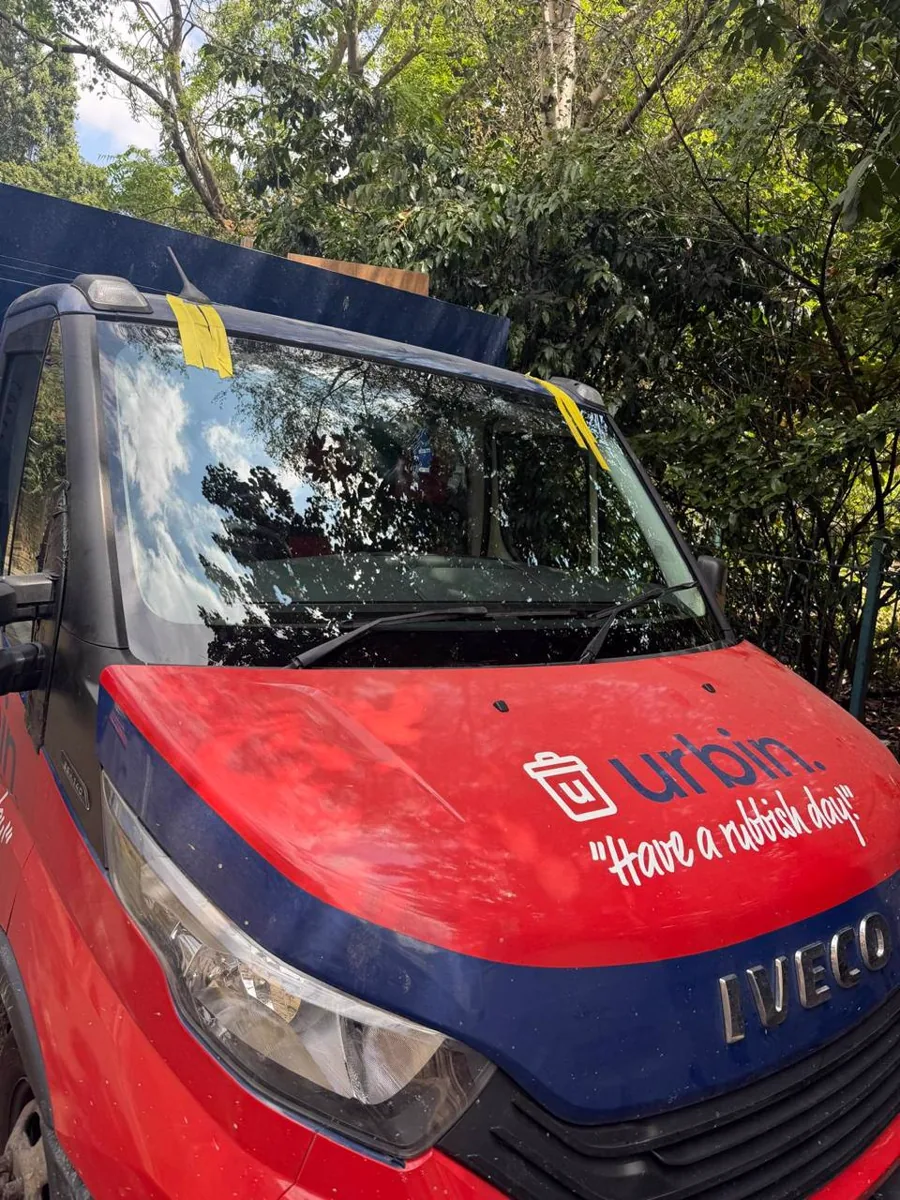 Completed windscreen job on a red commercial van