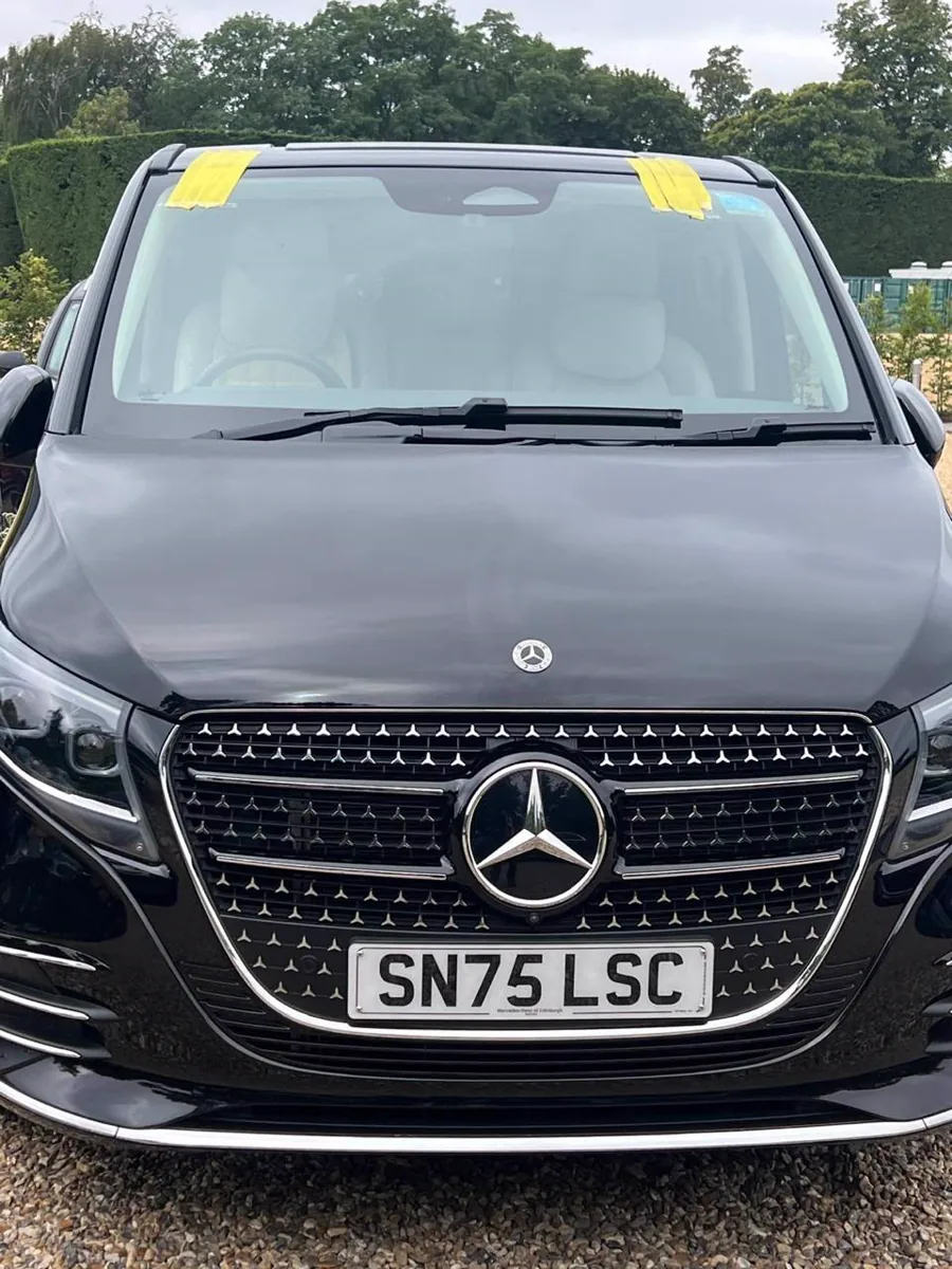Completed windscreen job on a black Mercedes