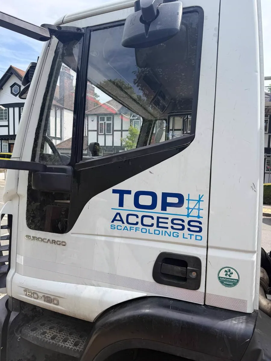 Replacement glass fitted to an access vehicle