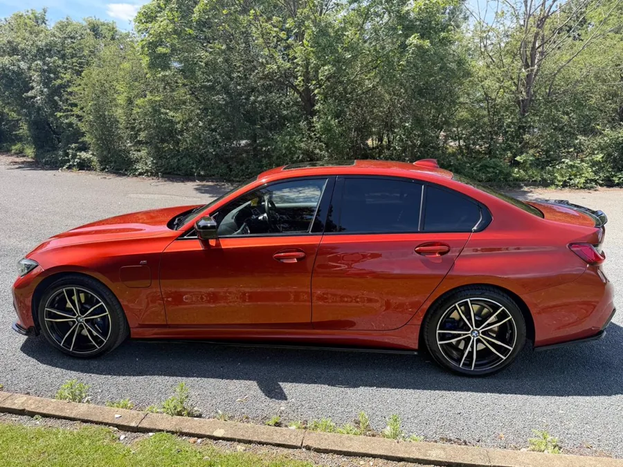 Red BMW returned to the road after glass work