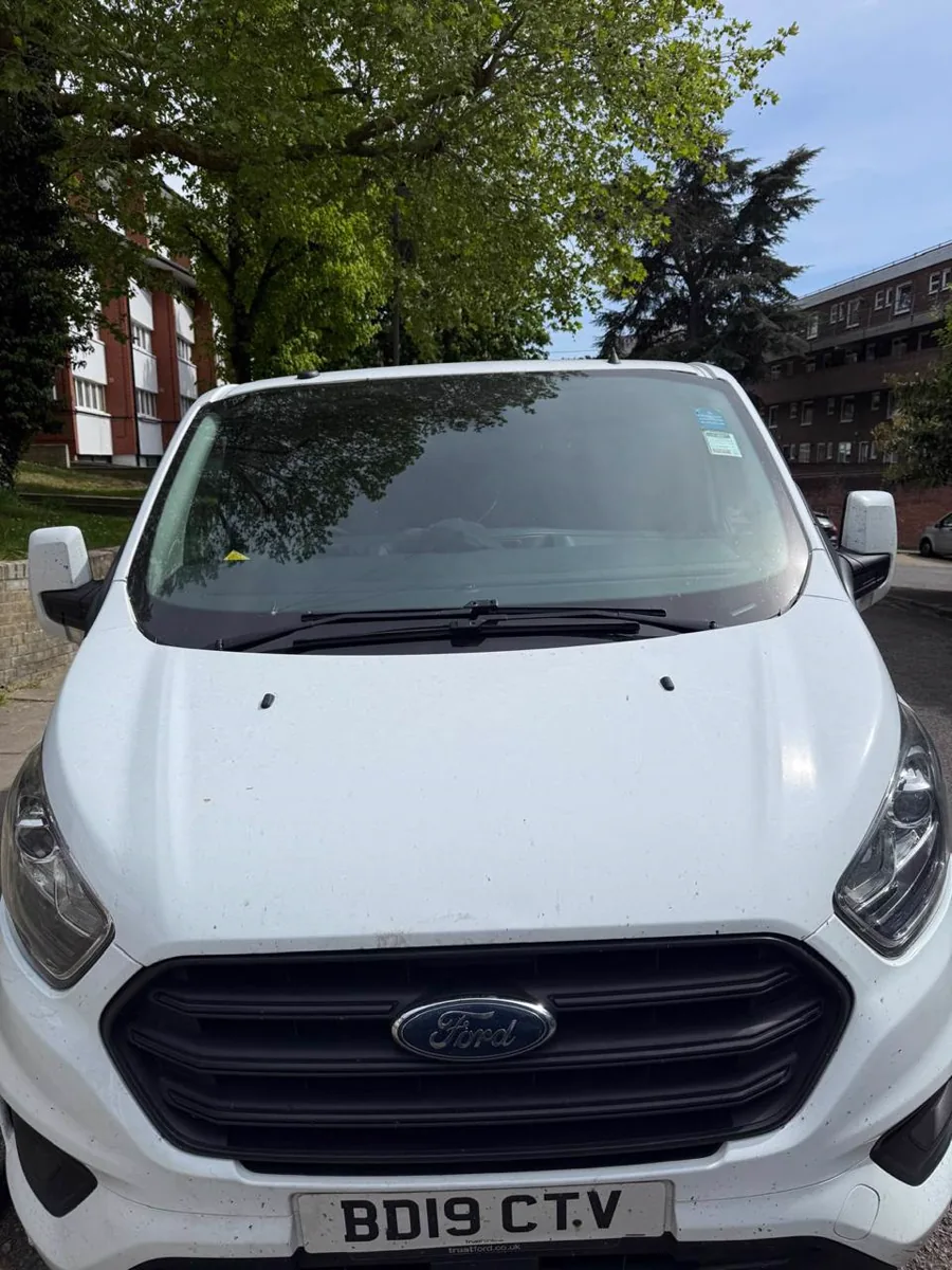 White Ford van after completed mobile glass work